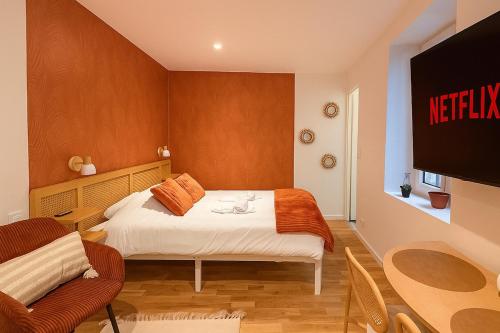 Ένα ή περισσότερα κρεβάτια σε δωμάτιο στο Le Bali Mâconnais Cozy - Station - 2 people