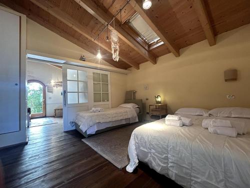 Кровать или кровати в номере La Stellata - Casale Toscano Luxury con piscina