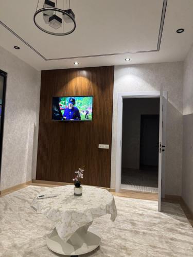 Televiisor ja/või meelelahutuskeskus majutusasutuses Feel at home