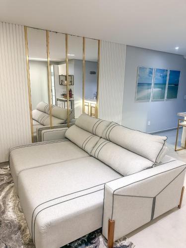 Χώρος καθιστικού στο Apartamento Pé na areia