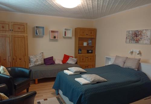 Ένα ή περισσότερα κρεβάτια σε δωμάτιο στο Tokaj-Wine Guesthouse and Spa