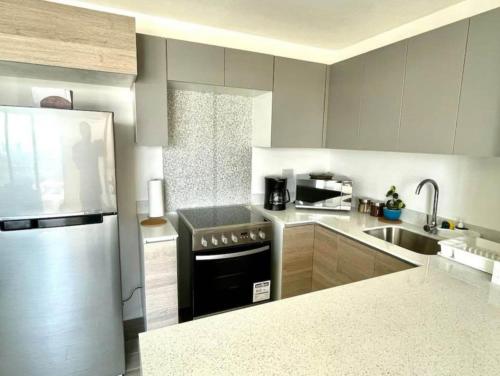 Η κουζίνα ή μικρή κουζίνα στο Zona 10