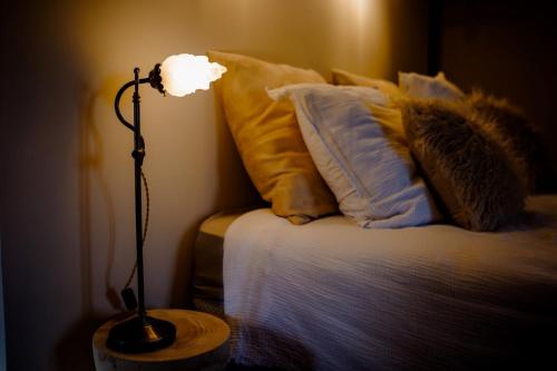 Postel nebo postele na pokoji v ubytování Chez Guilem chambre rose