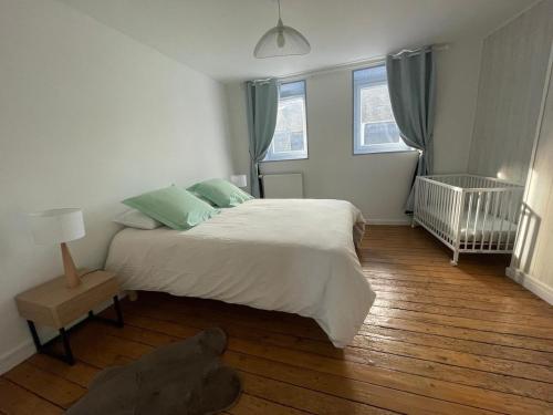 Ένα ή περισσότερα κρεβάτια σε δωμάτιο στο Comfort with garden