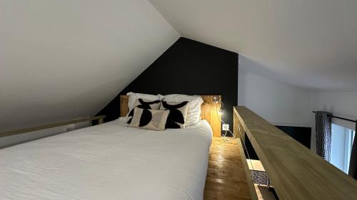 Postel nebo postele na pokoji v ubytování Le petit Terminus - Proche de la gare de Nevers