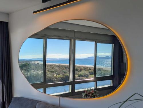 Appartement 2 chambres Vue mer & rivière 50m plage Clim & linge