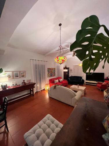 a living room with a couch and a table at Espacio Shangrila.One in Uceda