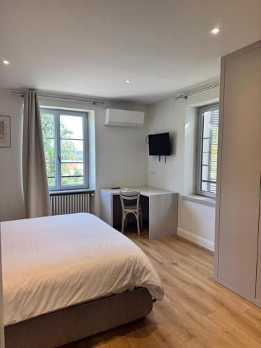 Postel nebo postele na pokoji v ubytování Villa du Parc de Scey