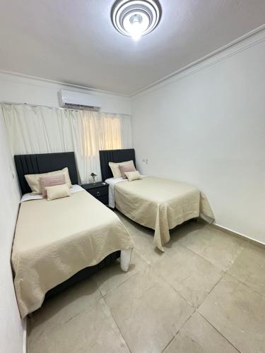 Voodi või voodid majutusasutuse Modern and fully equipped house in Samaná toas