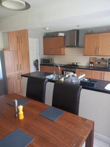 Kuchyň nebo kuchyňský kout v ubytování Millhouse Property