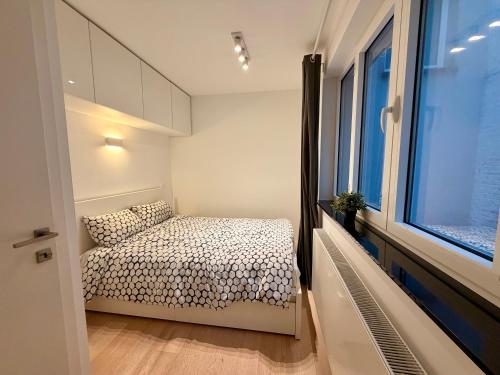 Ένα ή περισσότερα κρεβάτια σε δωμάτιο στο Louise