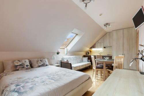 Postel nebo postele na pokoji v ubytování Vila Liepa