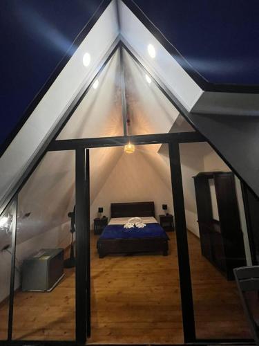 a bedroom in a tent with a bed in it at Cabaña alma del bosque in San Gil