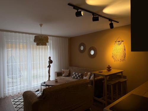 Postel nebo postele na pokoji v ubytování Andrra Apartment