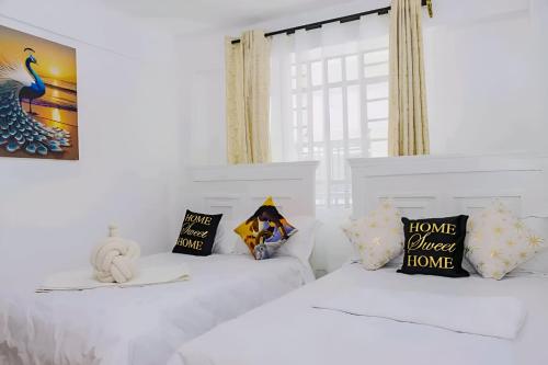 Ένα ή περισσότερα κρεβάτια σε δωμάτιο στο The Joseph Sport Property