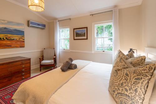 Postel nebo postele na pokoji v ubytování Corner House - Knysna