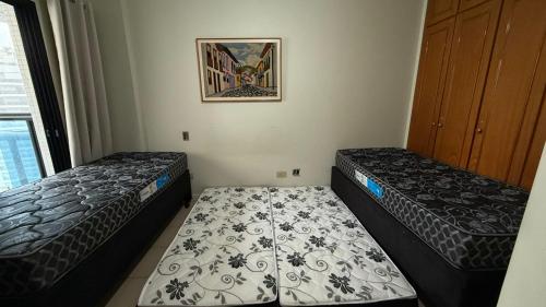 Ένα ή περισσότερα κρεβάτια σε δωμάτιο στο Flat Capitania Varam l beira-mar l 2 vagas l Serv Praia