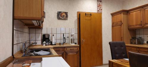 Kuchyň nebo kuchyňský kout v ubytování Ramiwi am Teutoburger Wald