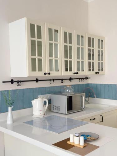 Kuchyň nebo kuchyňský kout v ubytování Апартаменты рядом с Пирамидой