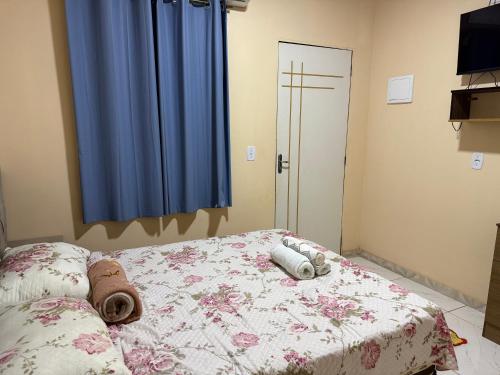 Ένα ή περισσότερα κρεβάτια σε δωμάτιο στο Caribe de Alter - Hotel & Pousada