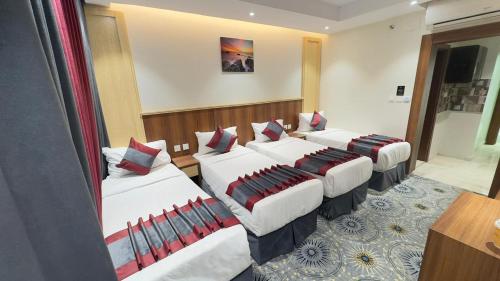 Postel nebo postele na pokoji v ubytování فندق مسار المسك Masar Almisk Hotel