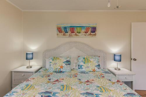 En eller flere senge i et værelse på SeaGrass