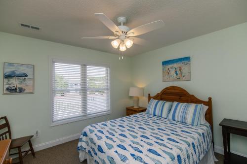 En eller flere senge i et værelse på The Ellis House