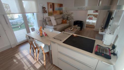 Η κουζίνα ή μικρή κουζίνα στο Apartamento EL REAL - Espartinas - SEVILLA