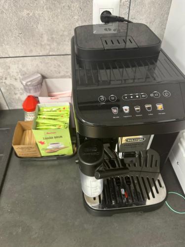 a coffee maker sitting on top of a counter at Apartament Central Ilie Balaci 15 in Craiova