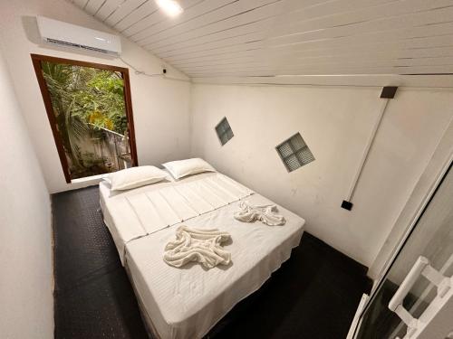 Voodi või voodid majutusasutuse Noahs House toas