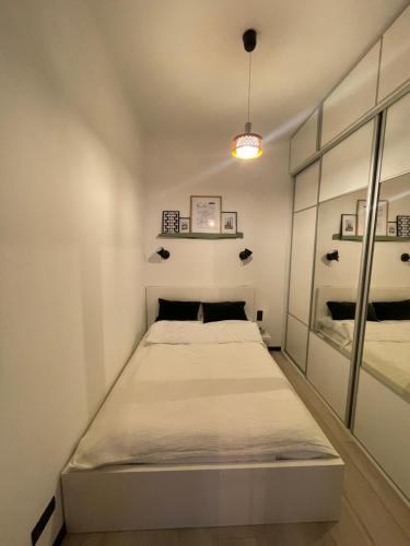 Ένα ή περισσότερα κρεβάτια σε δωμάτιο στο Iron Loft apartment