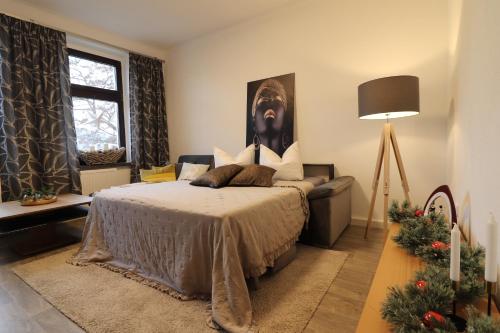 En eller flere senge i et værelse på Auer Talblick