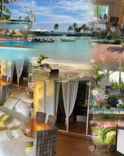 a view of a hotel room with a view of the ocean at ocean view, on the beach. in Le Gosier
