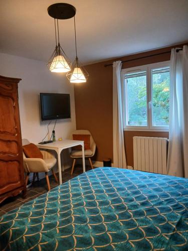 Postel nebo postele na pokoji v ubytování Chambre(s) d'hôte chez Mam's