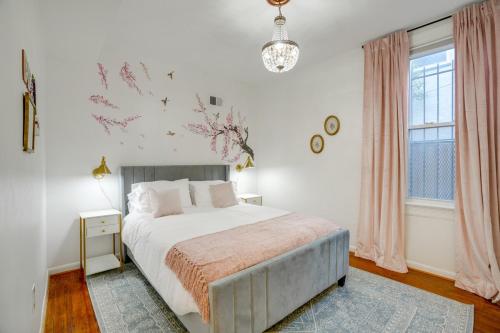 a bedroom with a large bed and a window at Cap Hill Row 2 Bedrooms, Walk to Sights, Parking in Washington, D.C.