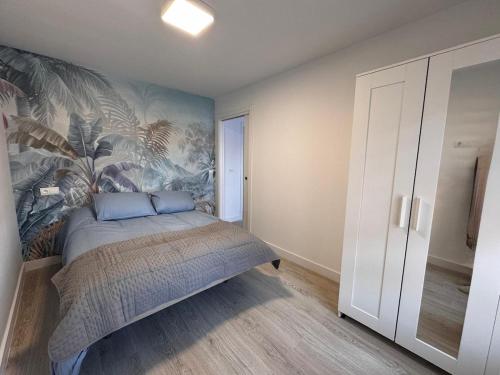 Postel nebo postele na pokoji v ubytování Apartamentos Turísticos Las Claras 1