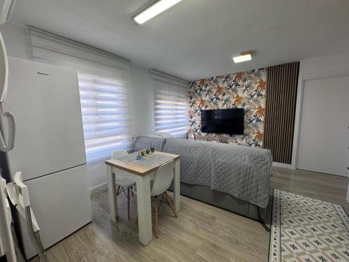 Postel nebo postele na pokoji v ubytování Apartamentos Turísticos Las Claras 1