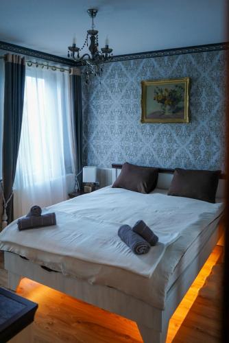 Ένα ή περισσότερα κρεβάτια σε δωμάτιο στο Pirin Elegance Apartment by Gondola Lift