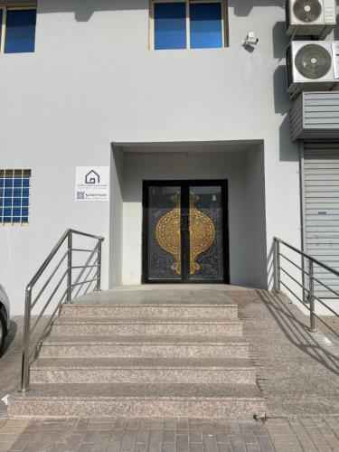 Facaden eller indgangen til Deluxe Studio Self Check In