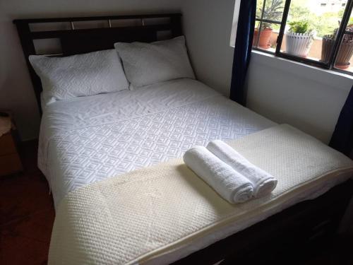 Ένα ή περισσότερα κρεβάτια σε δωμάτιο στο Casa del cielo