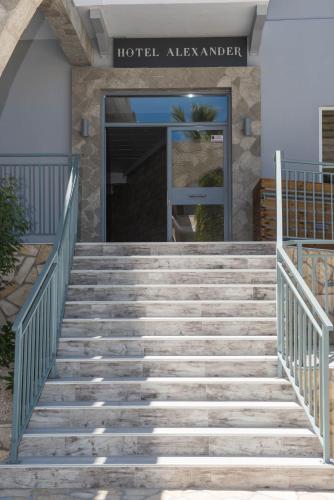 a set of stairs leading to a hotel albuquerque at Alexander The Great Hotel in Laganas