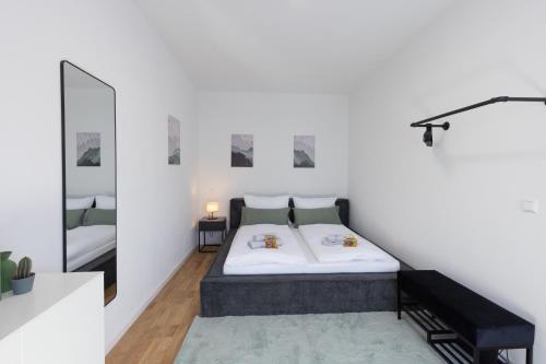 Ένα ή περισσότερα κρεβάτια σε δωμάτιο στο Premium Black Forest Suite - Apartment