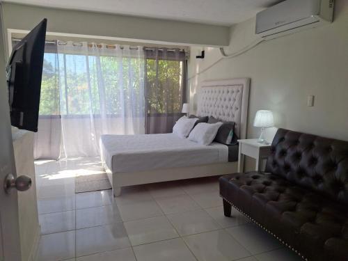 Fotografie z fotogalerie ubytování Penthouse on 2 floors in the middle of Sosua v destinaci Sosúa