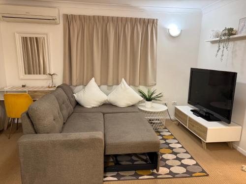 Μια τηλεόραση ή/και κέντρο ψυχαγωγίας στο Guesthouse in fantastic location