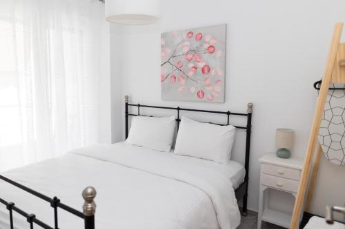 Giường trong phòng chung tại Santa Marina 8