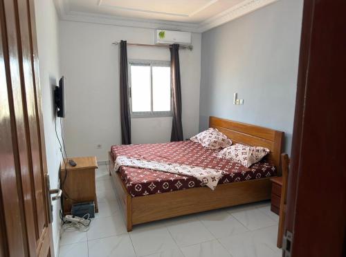 Llit o llits en una habitació de Le nid douillet