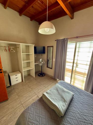 Ένα ή περισσότερα κρεβάτια σε δωμάτιο στο Departamentos Norte 2