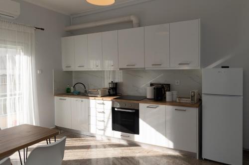 Kuchyň nebo kuchyňský kout v ubytování Santa Marina 10