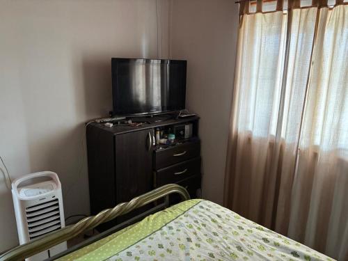 TV a/nebo společenská místnost v ubytování Casa Mirador Del Lago