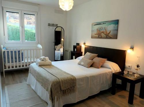 Postel nebo postele na pokoji v ubytování Chalet con piscina y diversión Ría de Vigo
